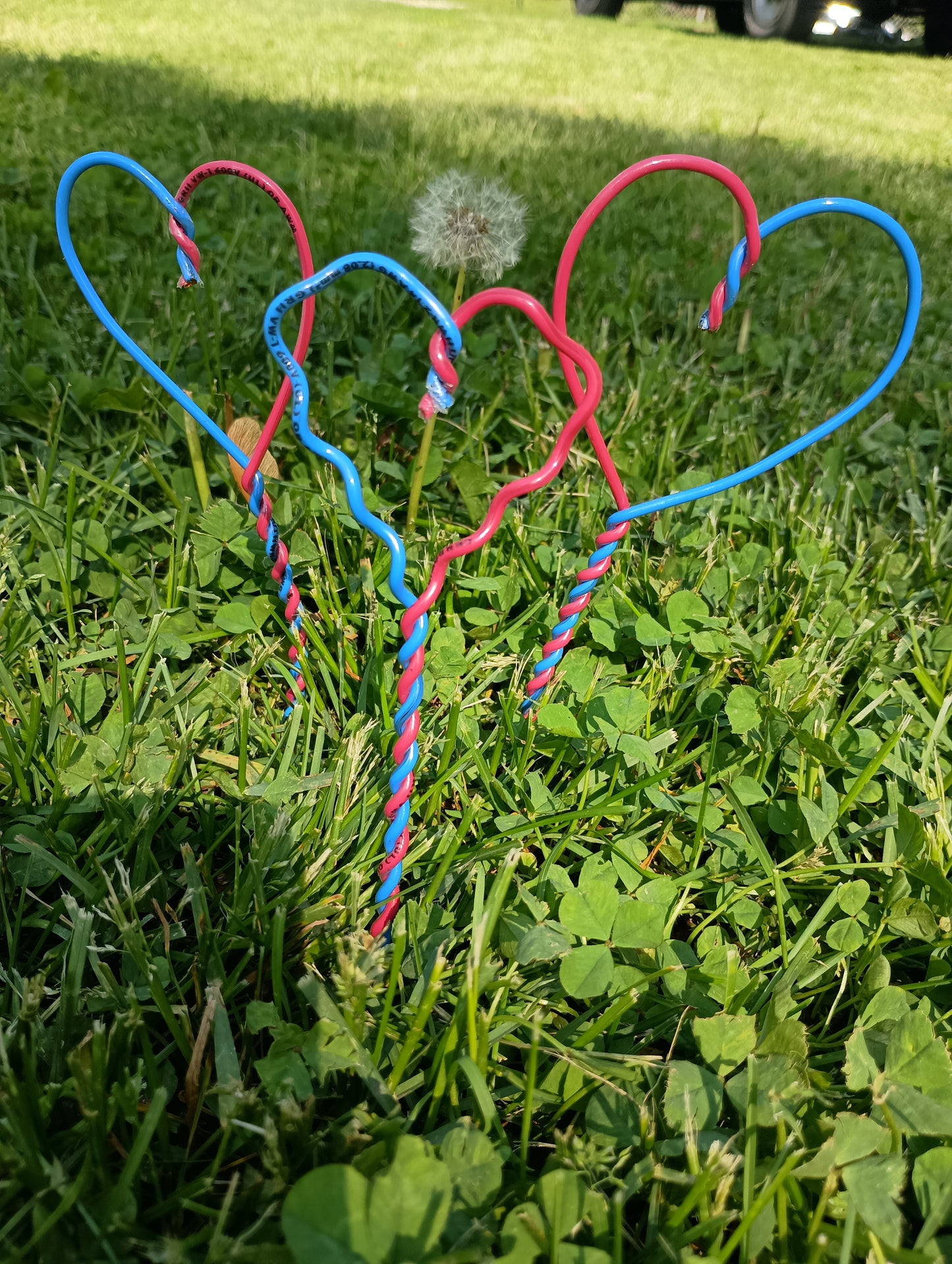 Small Handcrafted Copper Wire Hearts Embodying Love's True Virtue